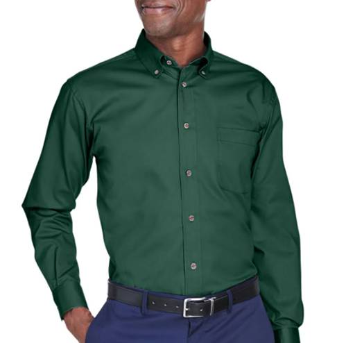 A male wearing a hunter green button up shirt